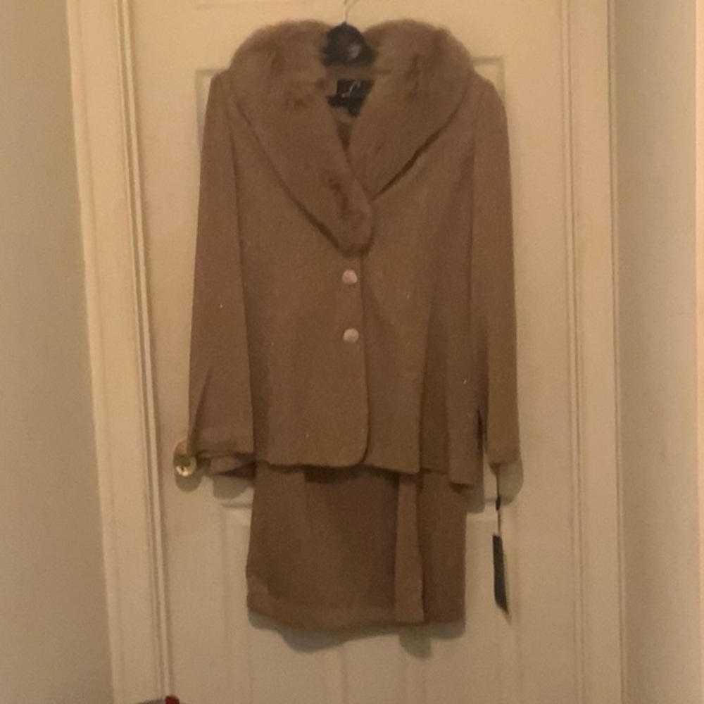 Tan sparkled 2 piece suit with a fur collar.